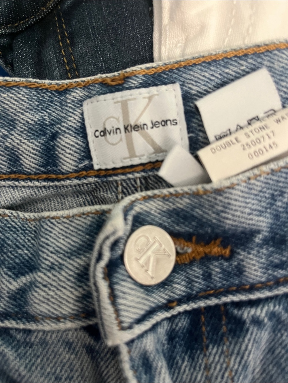 Vintage Calvin Klein Jeans blue stonewash denim with CK hardware